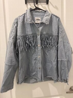 Blue denim jacket with reflective beads